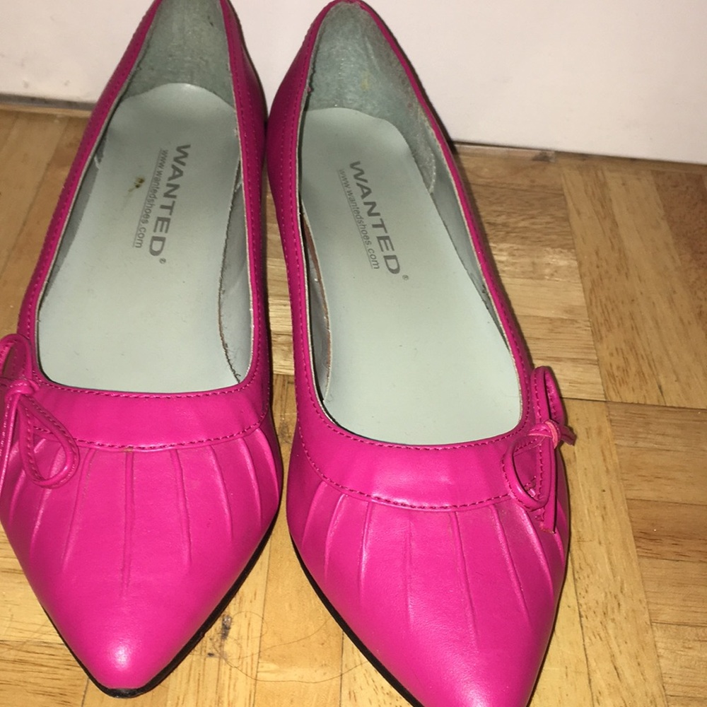 hot pink high heels with bow and detailing